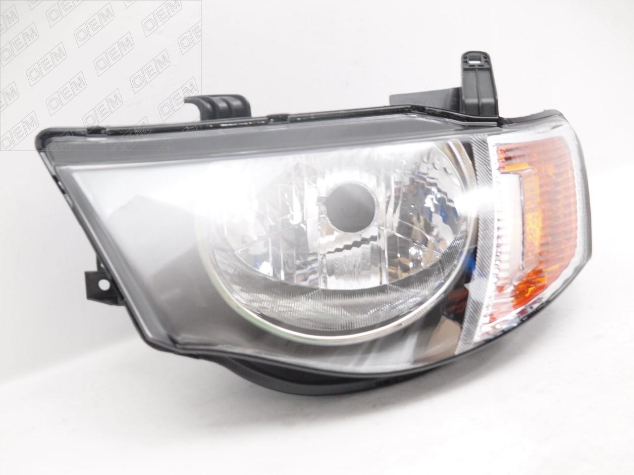 Фара левая  Mitsubishi  L200  4 