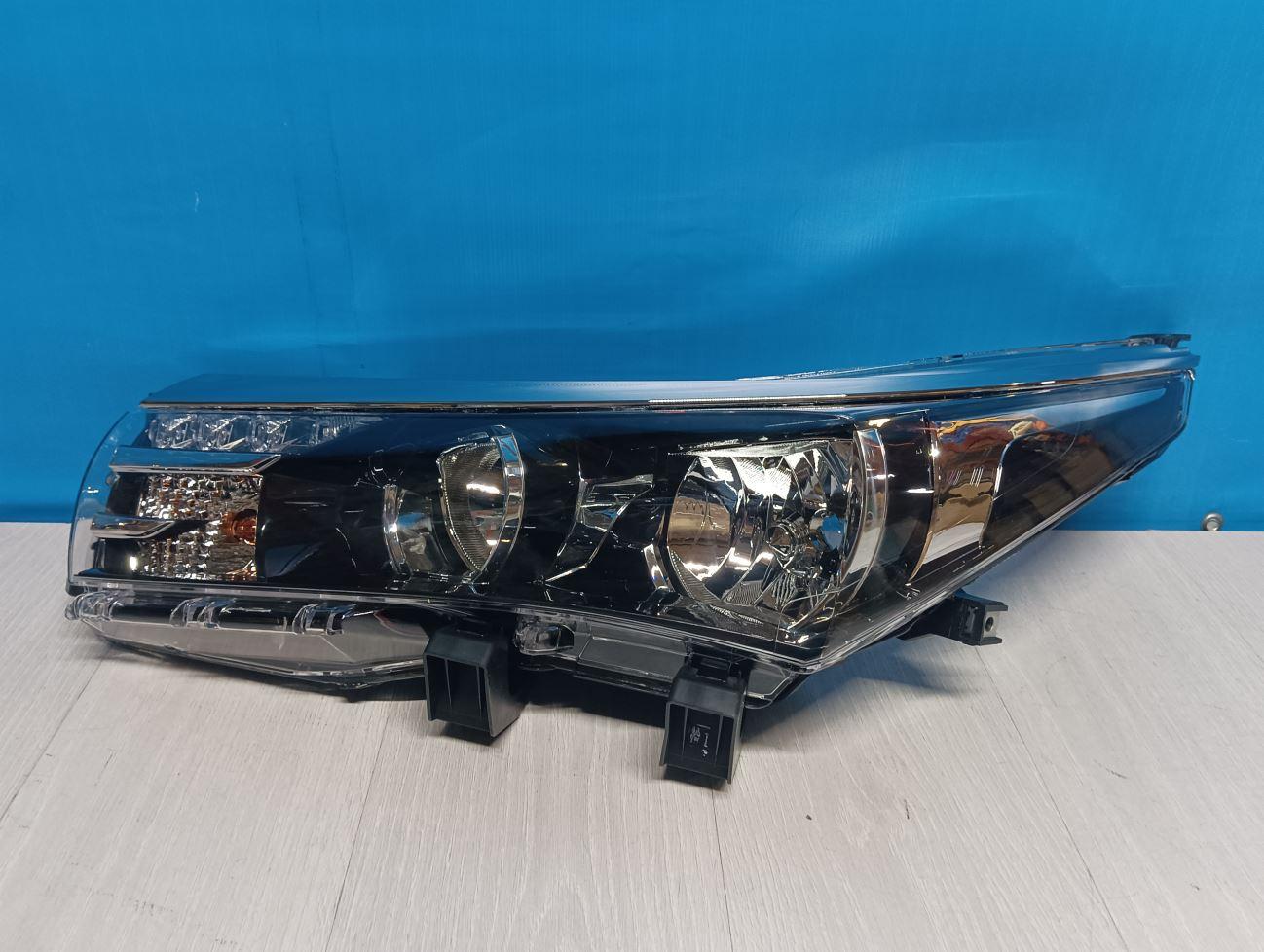 Фара левая  Toyota  Corolla  11 E180 
